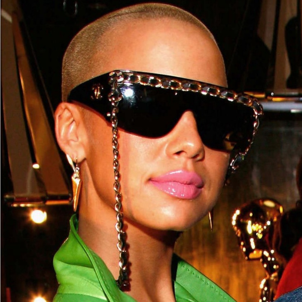 Authentic vintage Chanel sunglasses with leather gold chain